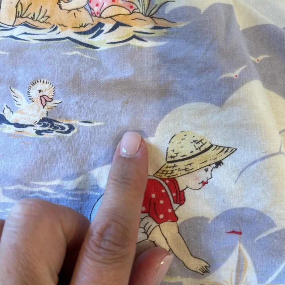 Adorable vintage beach print bib with terry backing